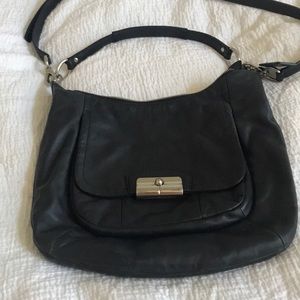 Beautiful black coach two strap saddle bag